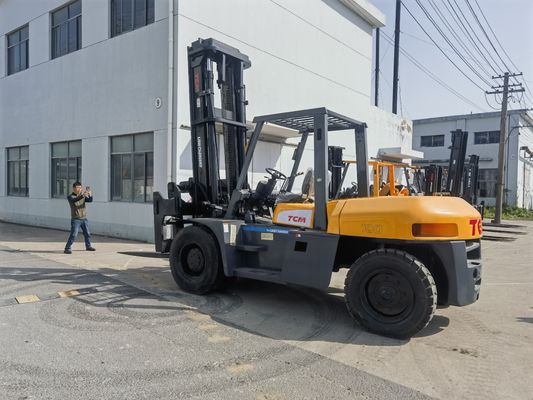 10 tonnellate di carrello elevatore diesel TCM giapponese FD100 Usato carrello elevatore con larghezza di forcella Sconto di routine
